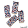 Set of four patterned napkins on a white background.