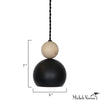A pendant light with a black and beige spherical design on a white background, featuring measurements, designed by Michele Varian.