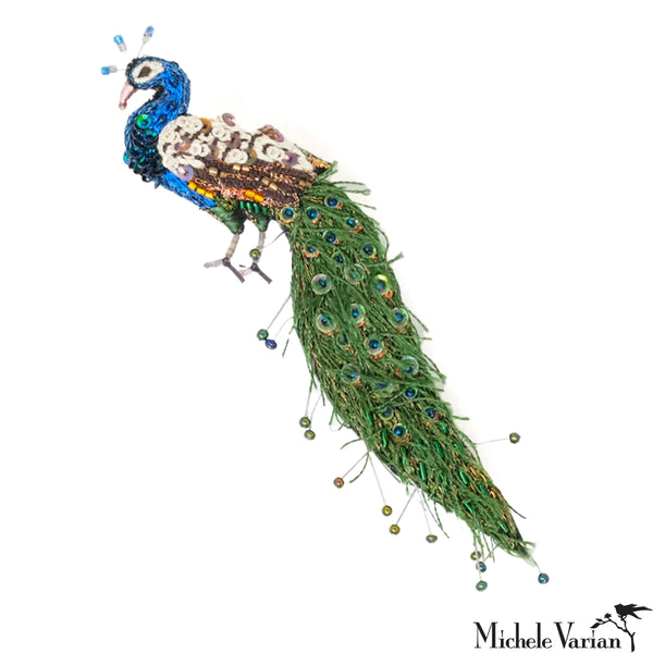 Decorative peacock with colorful feathers on a white background