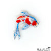 Colorful fish-shaped object with red, blue, and white colors on a white background