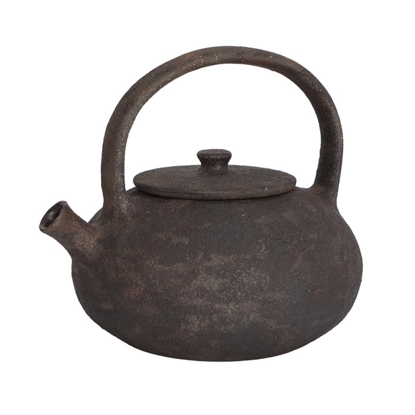 Brown ceramic teapot on a white background