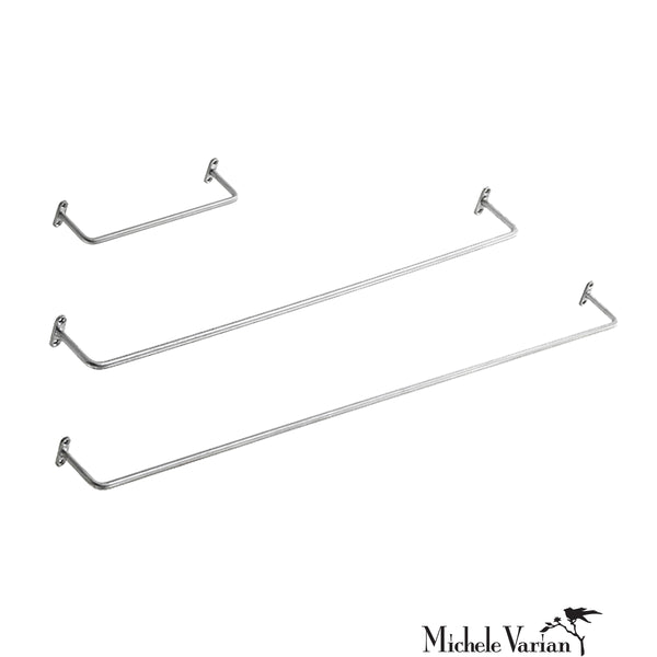 Set of three metal towel racks on a white background with 'Michele Varian' branding.