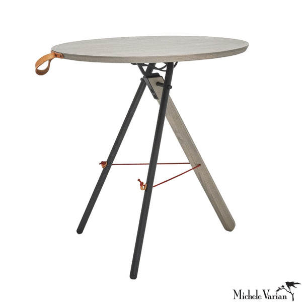 https://michelevarian.com/cdn/shop/products/Folding-Table_Dark-Ash-Three-Quarter_695_1800x1800_2b8d9855-0e4a-4e79-8602-cb7acc020602_grande.jpg?v=1618004940